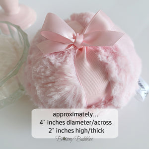pink powder pouf